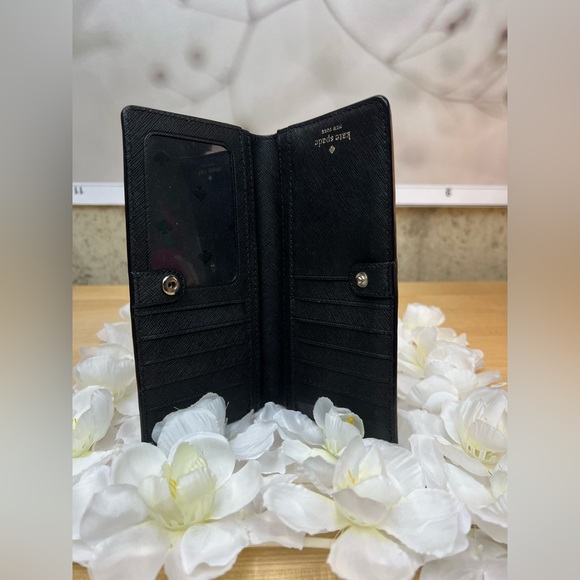 Kate Spade Staci Large Slim Bifold Wallet.
Tropic Leaves - Picture 7 of 9